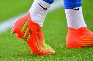 Detail on the boots of France goalkeeper Pauline Peyraud-Magnin during the UEFA Women's Euro England 2022 group D match between France and Belgium at The New York Stadium on July 14, 2022 in Rotherham, United Kingdom.