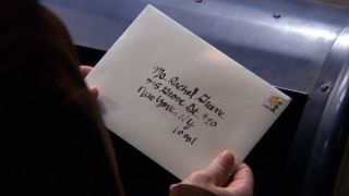 Ross' wedding invitation is addressed to Rachel Greene on Season 4's "The One With the Invitation."