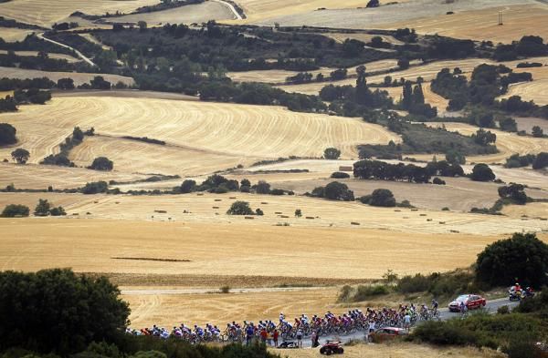 The Vuelta a Espana flies through the barren countryside