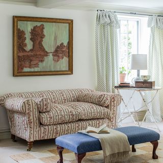 chesterfield sofa and footstool in a country style living room