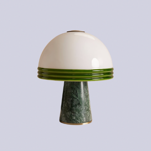 A green dome shaped table lamp