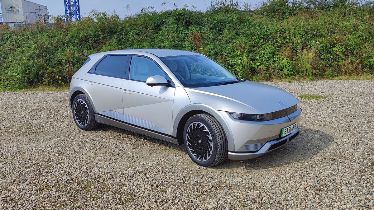Side-on, at an angle, view of Ioniq in gravel parking lot