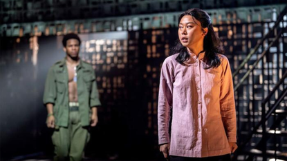 Christian Maynard and Jessica Lee on stage during a production of Miss Saigon