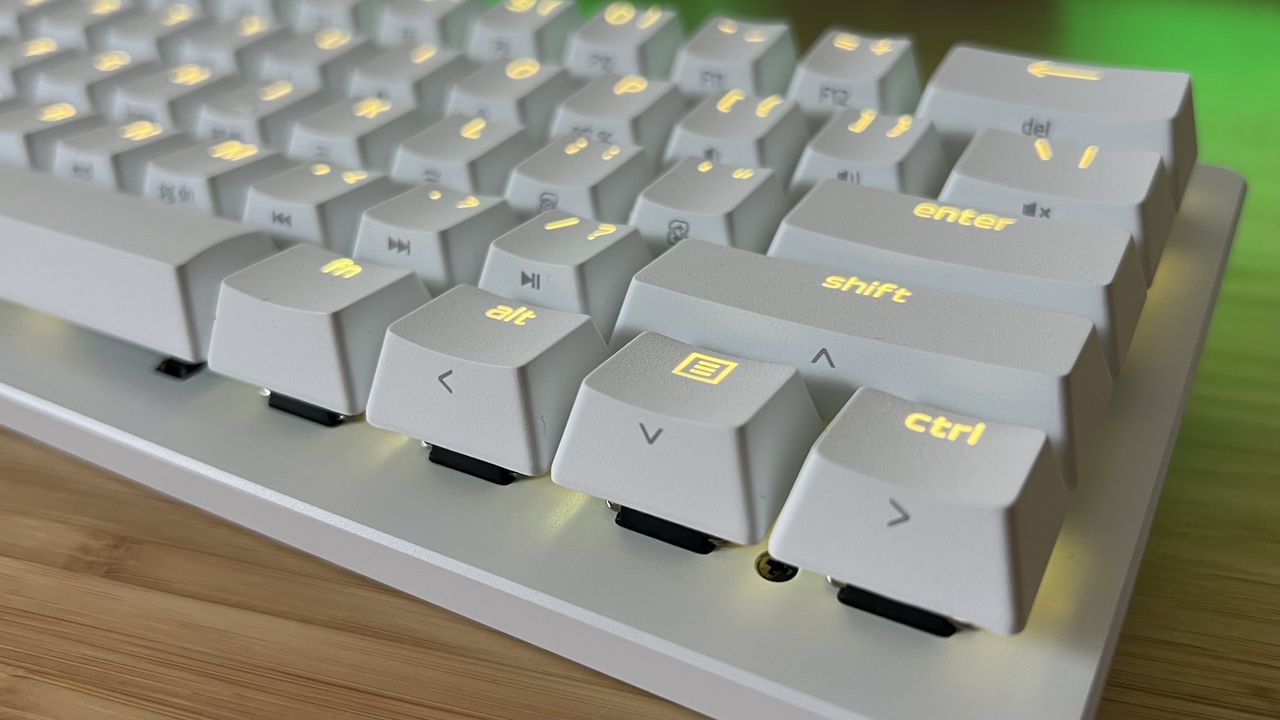 Close up on dual-function arrow buttons on Razer Huntsman V3 Pro Mini gaming keyboard