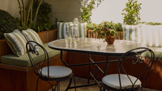 nomad developments outdoor dining area with banquette seating