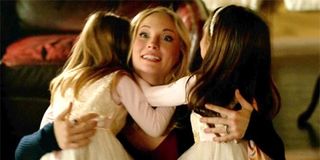 Candice King as Caroline Forbes with young Lizzie and Josie Saltzman on The Vampire Diaries The CW