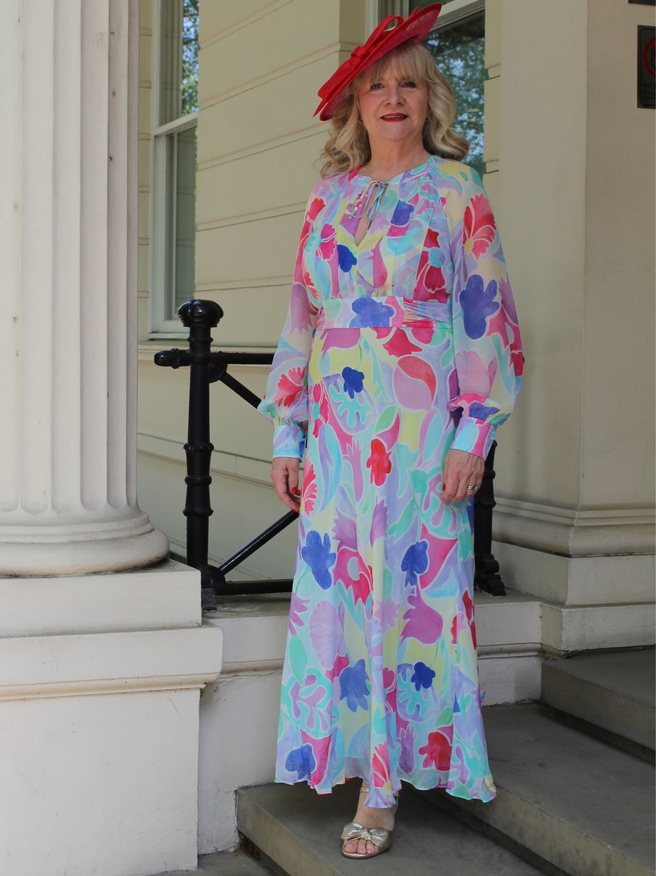 Julie pLayer wearing Rixo dress