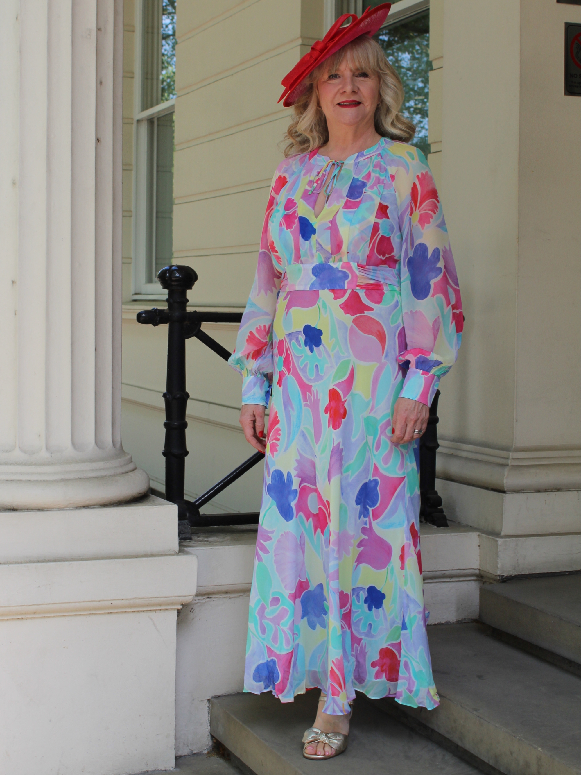 Julie pLayer wearing Rixo dress