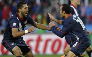 Landon Donovan (right) and Clint Dempsey celebrate a goal for the United States against Slovenia at the 2010 World Cup.