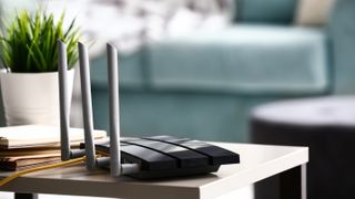 A Wi-Fi router on a table.