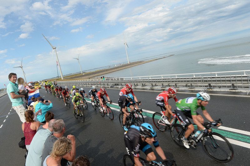 The peloton speeds by