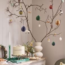 branch Easter tree in vase with hanging decorations