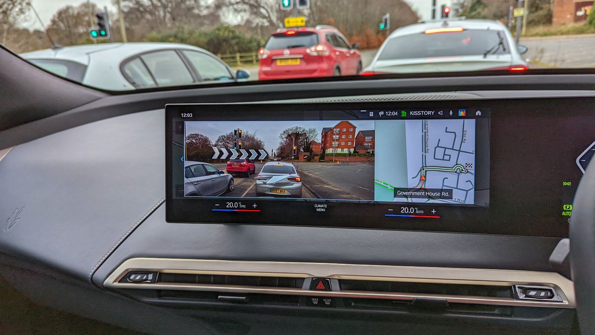Close-up of the central display in the BMW iX with AR navigation