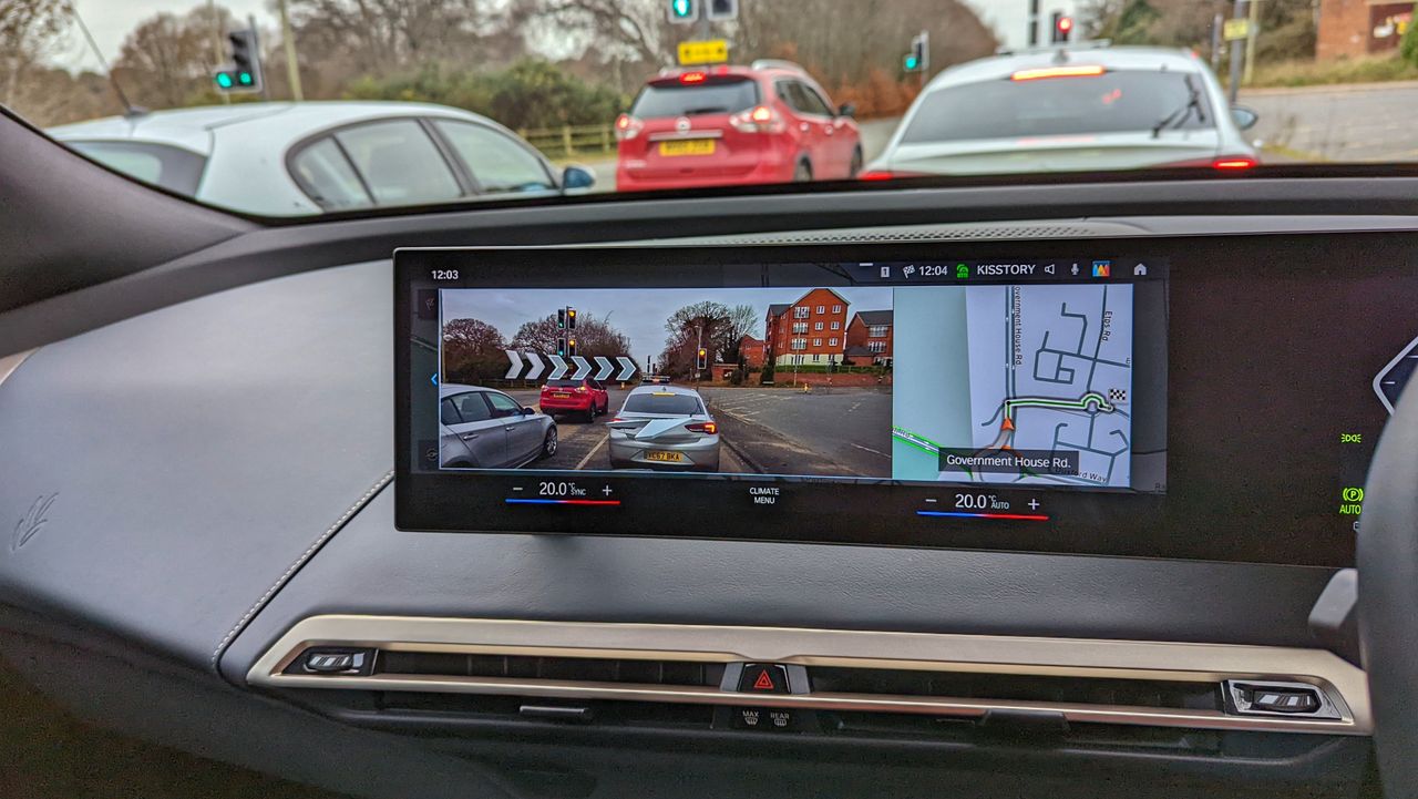 Close-up of the central display in the BMW iX with AR navigation