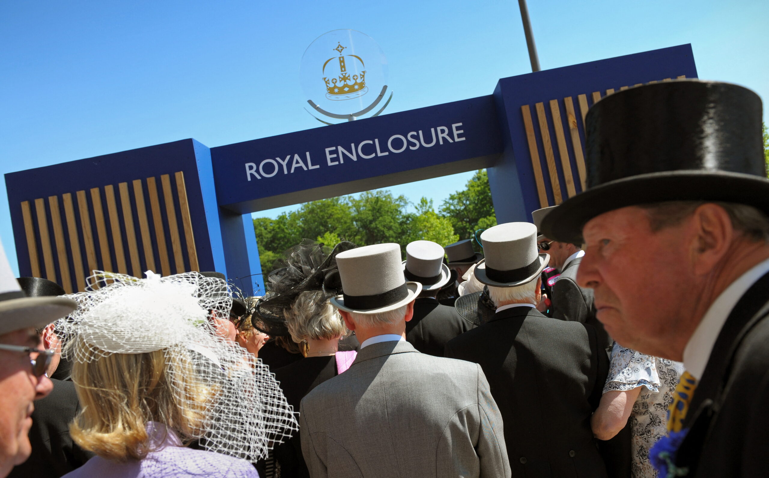 Racegoers queue for a position in the Royal Enclosure at Royal Ascot