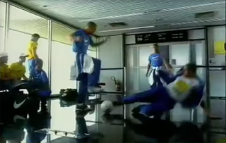 Brazil airport advert Roberto Carlos slide tackle