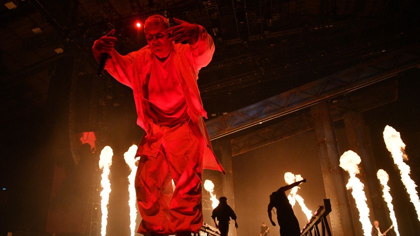 Winston McCall on stage surrounded by fire