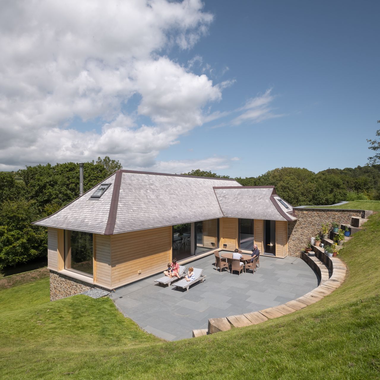The stunning roof of The Boathouse is reminiscent of a boat&rsquo;s gracefully curved hull, but there is more to this elegant design than just that. The roof profile was developed and built on site by Tristan and Lizzie&rsquo;s trusted carpenter. Then, the carpenter laid the yellow cedar shingles in lap joints.