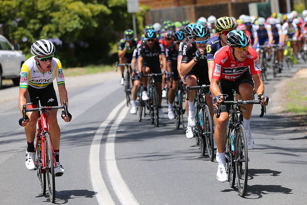 Miles Scotson (BMC) in the Australia champion's jersey, and Jay McCarthy (Bora-Hansgrohe) in the red sprint jersey.