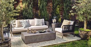 Quiet luxury garden trend with large concrete coffee table