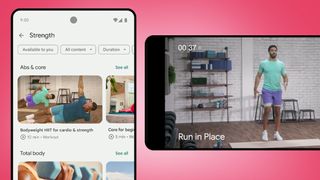 Ein Mobiltelefon auf rosa Hintergrund, das die neu gestaltete Fitbit-App zeigt