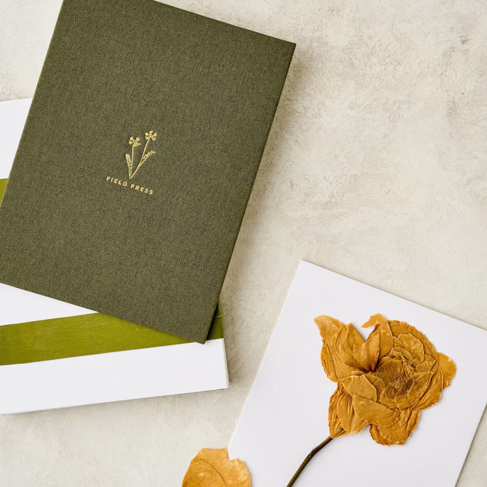 Flower press book with green linen cover
