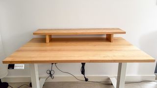 Desky Dual Hardwood standing desk in White Ash finish with matching wooden monitor stand