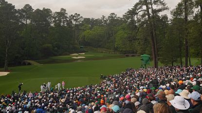 A player hits off the 12th tee during the 2023 Masters