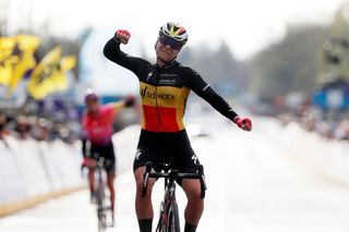 Lotte Kopecky winning the Tour of Flanders in the Belgian champion's jersey in 2022