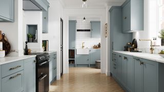 pale blue kitchen with utility room