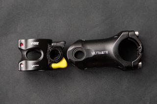 USE Vybe stem with black rebound and yellow compression elastomers in place