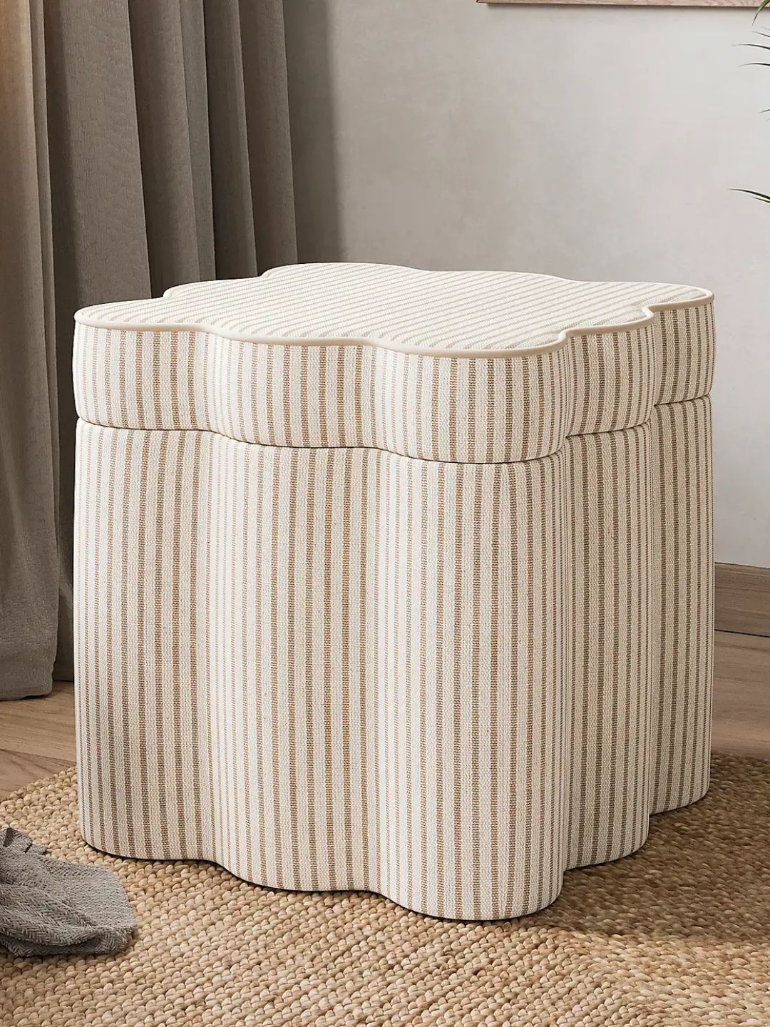 A tiny tripe storage footstool from Dunelm