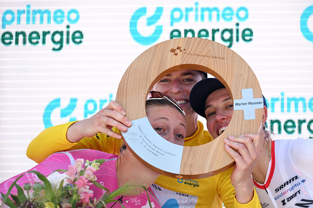 VILLARS-SUR-OLLON, SWITZERLAND - JUNE 21: (L-R) Cedrine Kerbaol of France and Team EF Education-Oatly, Marlen Reusser of Switzerland and Team Movistar - Yellow leader jersey and Kasia Niewiadoma of Poland and Team CANYON//SRAM zondacrypto celebrate at podium with the trophy during the 10th Tour de Suisse Women 2026, Stage 5 a 100.4km stage from Villars-sur-Ollon to Villars-sur-Ollon 1249m / #UCIWT / on June 21, 2026 in Villars-sur-Ollon, Switzerland. (Photo by Tim de Waele/Getty Images)