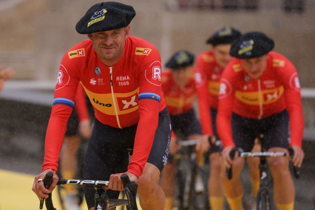 UnoX Pro Cycling Teams Norwegian rider Alexander Kristoff cycles to the stage during the official teams presentation near the Guggenheim Museum Bilbao in Bilbao northern Spain on June 29 2023 two days prior to the start of the 110th edition of the Tour de France cycling race Photo by Thomas SAMSON AFP Photo by THOMAS SAMSONAFP via Getty Images