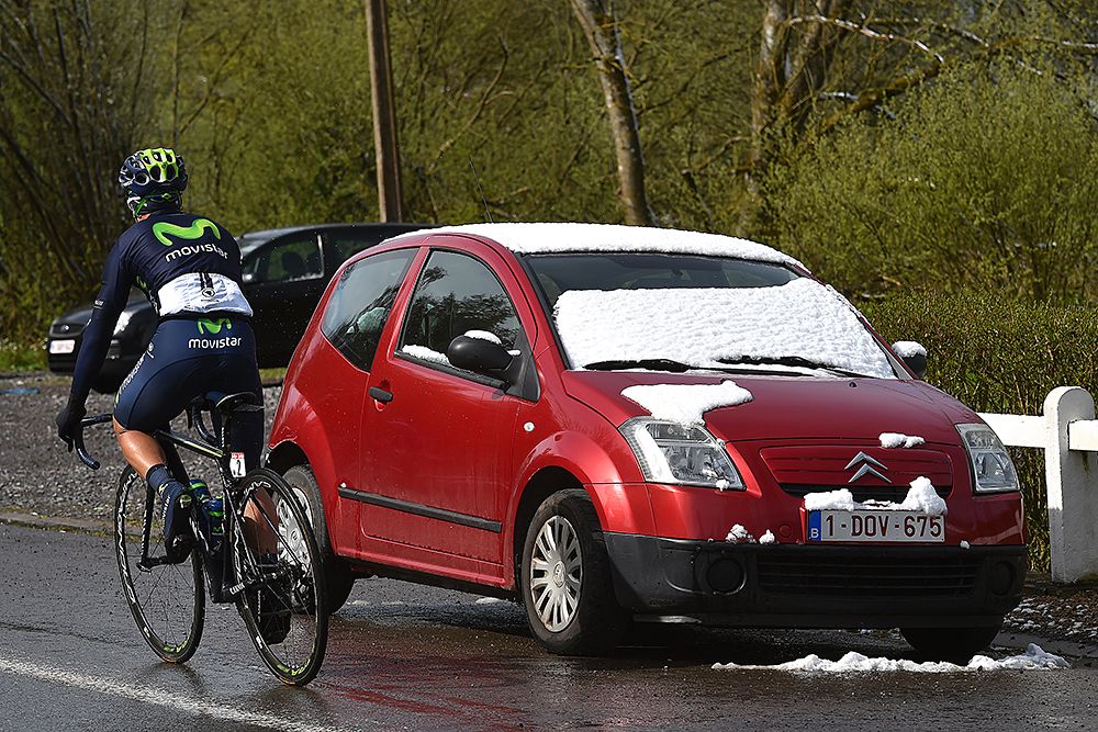 Snow on the cars at Liege-Bastogne-Liege