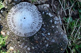 A geodetic control disk, or bench mark, used during the leveling survey.