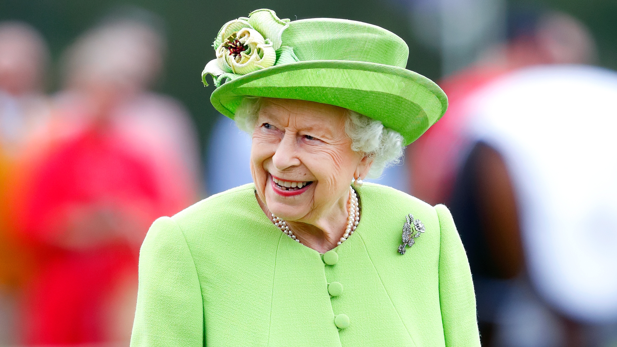 Queen Elizabeth II attends the Out-Sourcing Inc. Royal Windsor Cup polo match at Guards Polo Club, Smith's Lawn on July 11, 2021