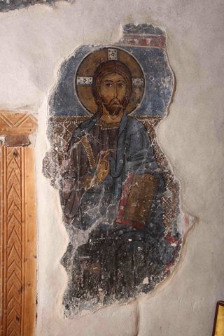 They found an asbestos-rich layer in the painting "Enthroned Christ," which would've been applied as a finish coating between a red paint layer and a plaster layer made up mostly of plant fibers.