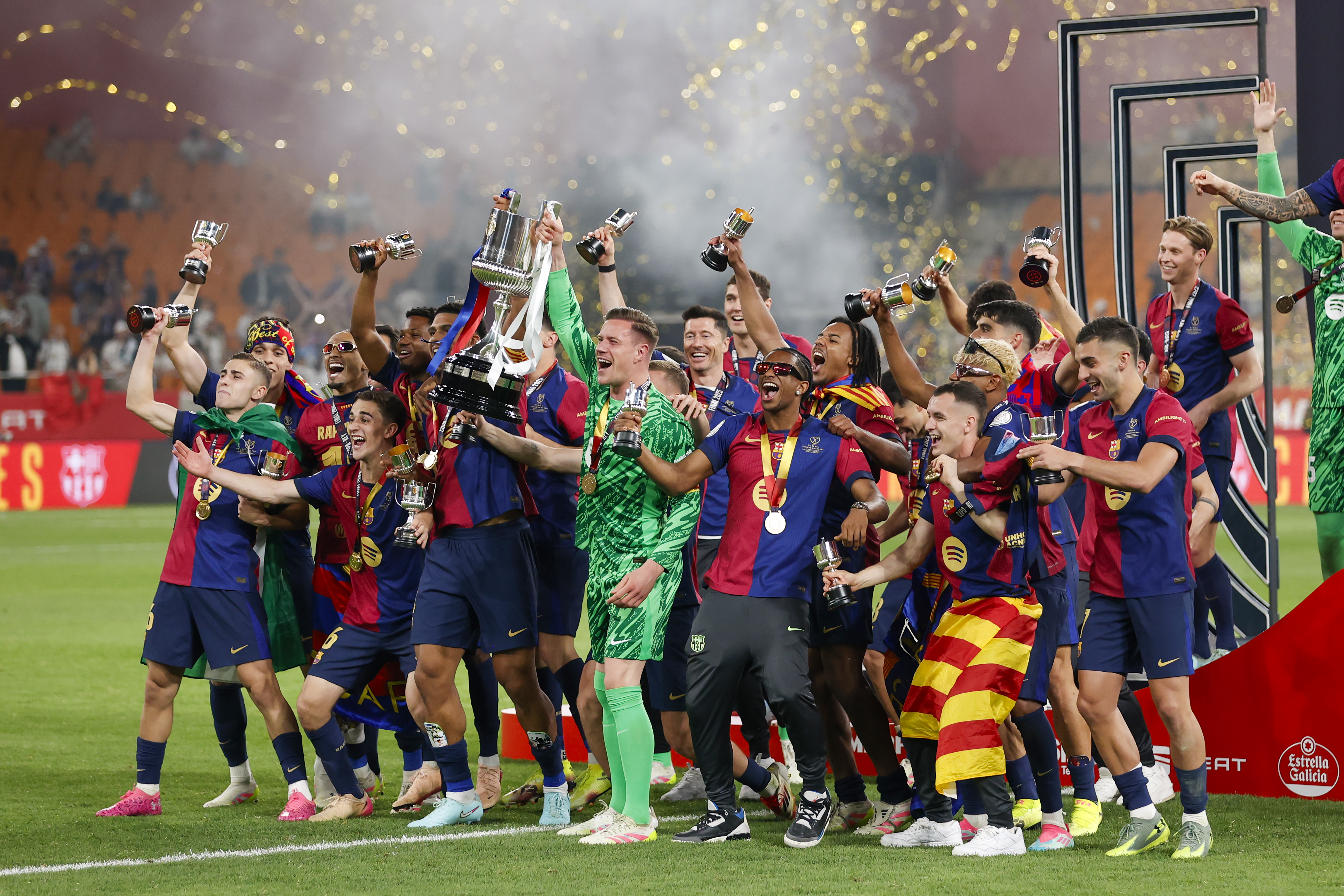Barcelona players celebrate their Copa del Rey final win over Real Madrid in April 2025.