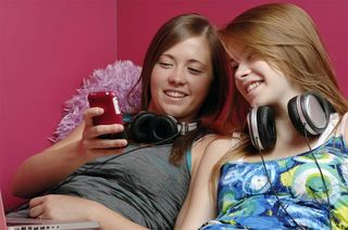 two teen girls on a cellphone