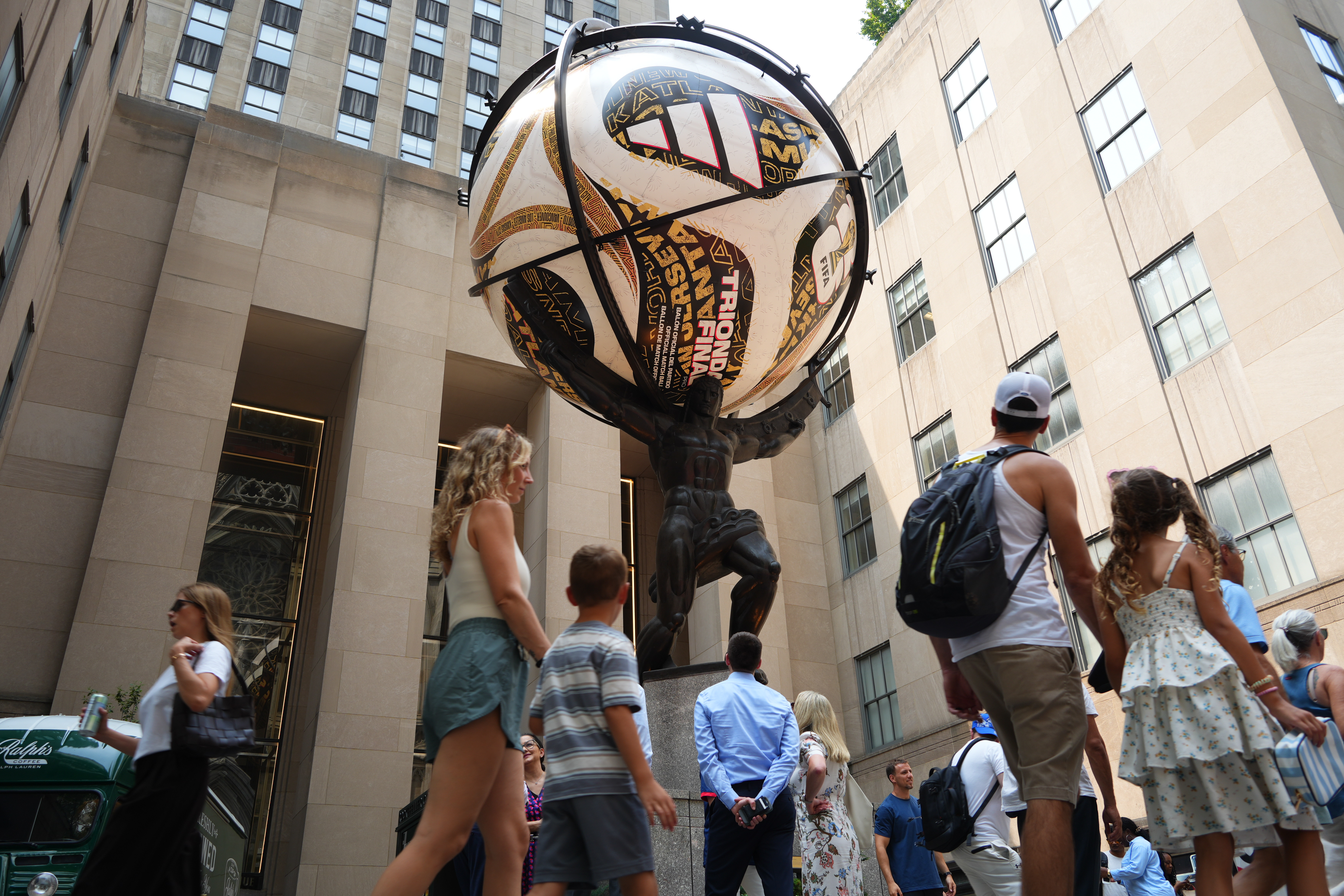 Atlas statue holding the Adidas ball stands at Rockefeller Center