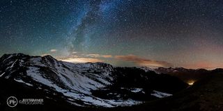 Colorado-based freelance photographer Jeff Warner captured this seven-image “stitch” of the Milky Way glowing over Loveland Pass. The faint, red glow of aurora borealis can also be seen to the right of the photo.