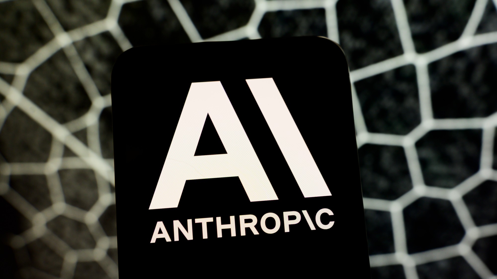An image of the Anthropic logo on a cell phone. 