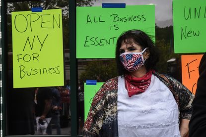 A woman protesting New York's coronavirus lockdown.