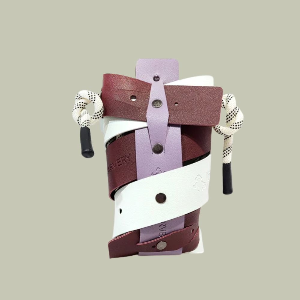 BlindbyJW Weaveasy Mobile Bag in bordeaux, white, and pink against a pale green background.