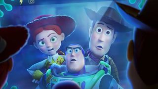 Jessie, Woody and Buzz look at Lilypad's screen in shock