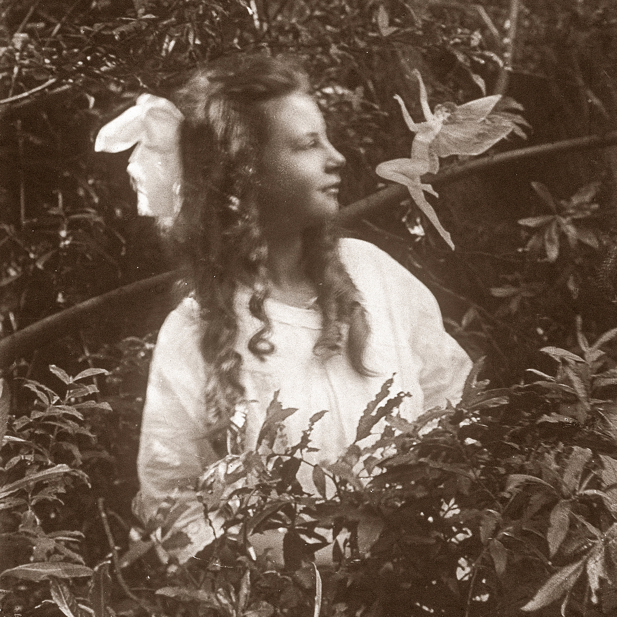 UNITED KINGDOM - OCTOBER 08: In the summer of 1917, 15-year-old Elsie 'Iris' Wright (1901-1988) and her 10-year-old cousin Frances 'Alice' Griffiths (1907-1996) claimed to have photographed fairies in a beck behind Elsie's home in Cottingley, near Bradford. The photographs of the 'Beck Fairies', as the girls called them, went on to become one of the most famous examples of image manipulation in photography. Alice was probably the name given to Frances by Sir Arthur Conan Doyle (1859-1930) in an attempt to conceal the girls' identities when he published the photographs. Although Elsie later admitted the photographs were fakes, Frances was more reticent. To her dying day she claimed that the girls had seen fairies, and that at least one of the photographs was genuine. (Photo by SSPL/Getty Images)