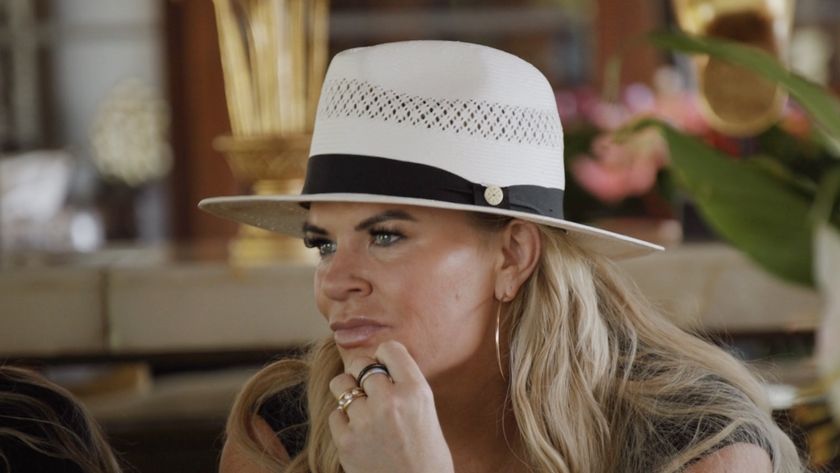 Heather wearing a hat being asked about Jen Shan in Ultimate Girls Trip