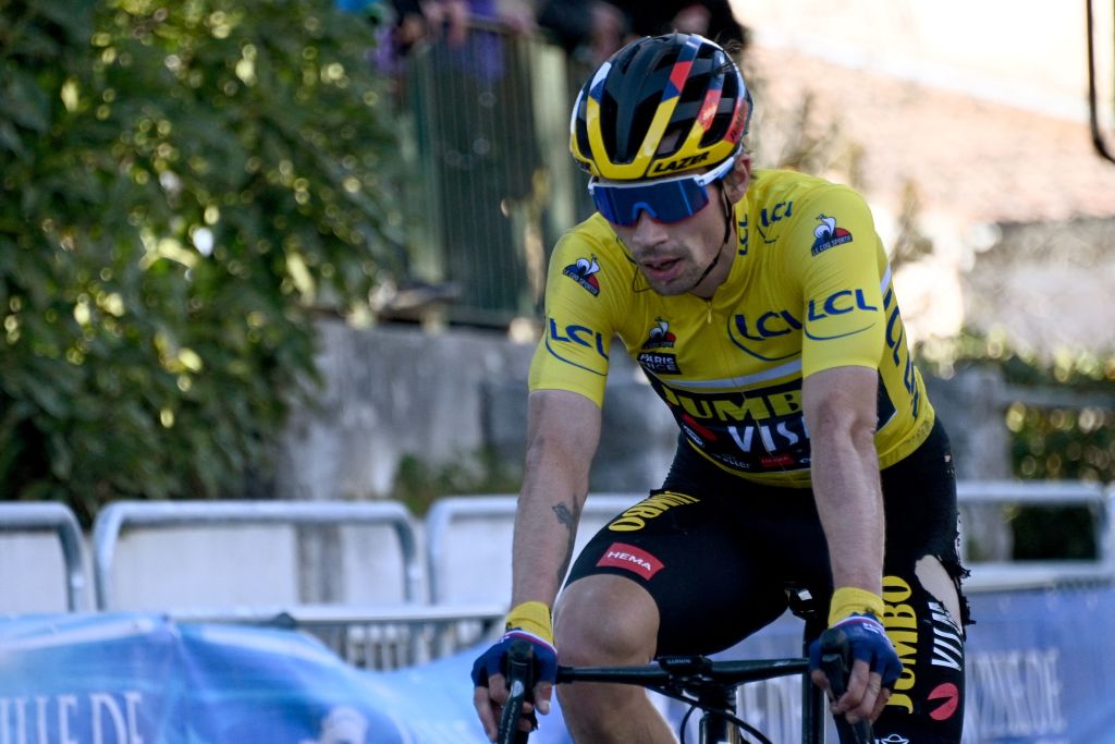 Team Jumbo rider Slovenias Primoz Roglic wearing the overall leaders yellow jersey crosses the finish line of the 8th stage of the 79th Paris Nice cycling race 93 km between Le PlanDuVar and Levens on March 14 2021 Photo by AnneChristine POUJOULAT AFP Photo by ANNECHRISTINE POUJOULATAFP via Getty Images