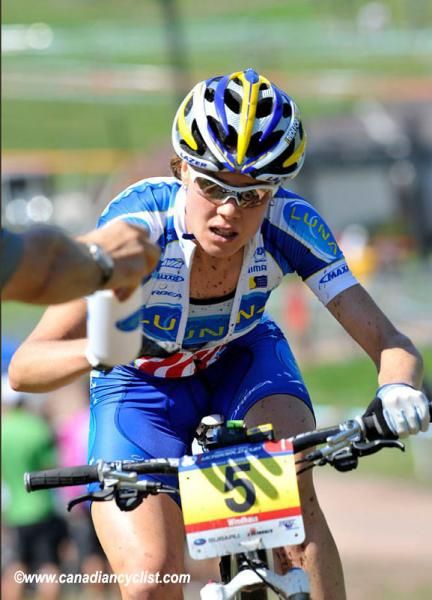 Georgia Gould (Luna Pro Team) takes a bottle.